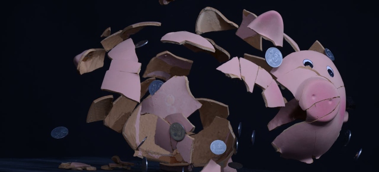5 Hidden Costs of Moving in Cincinnati 1 A broken piggy bank