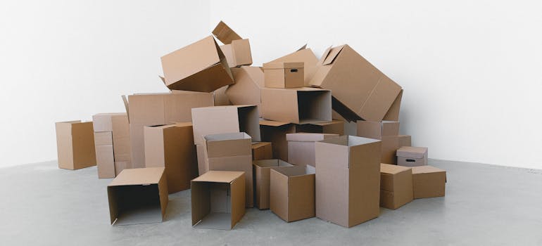 How to Pack Furniture When Moving to Cincinnati 2 moving boxes, illustrating how to pack furniture when moving