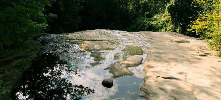 The best places in Ohio for outdoor enthusiasts 7 Smooth rock stream in shaded forest area
