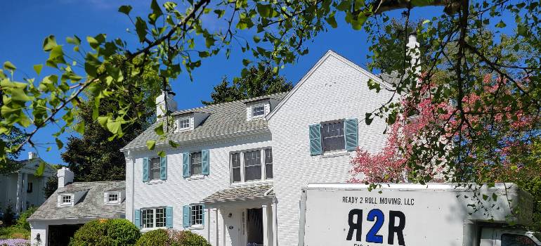 How does industrial-era architecture and heritage influence life in Middletown OH today 2 a moving van in front of a historic home