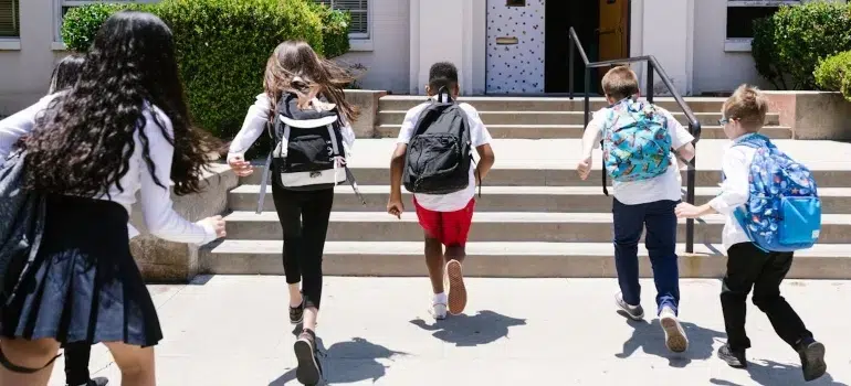 Relocating your family to Lebanon Ohio: Schools, parks & services 1 children running toward school, one of the main reasons for relocating your family to Lebanon Ohio