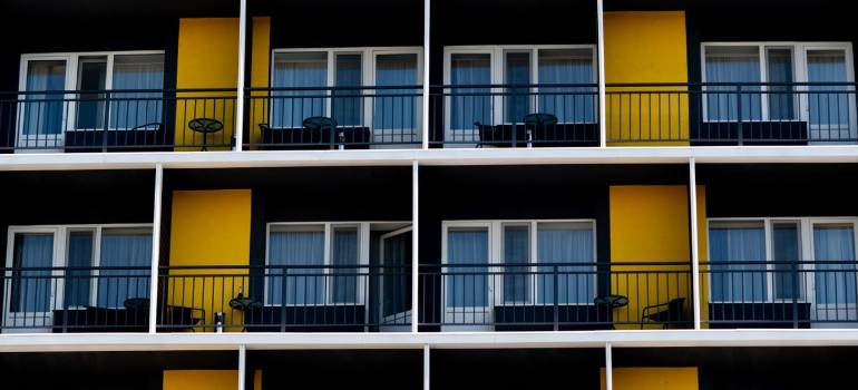 Over-the-Rhine apartments: 5 costly moving mistakes to avoid 2 Apartment balconies with yellow exterior walls